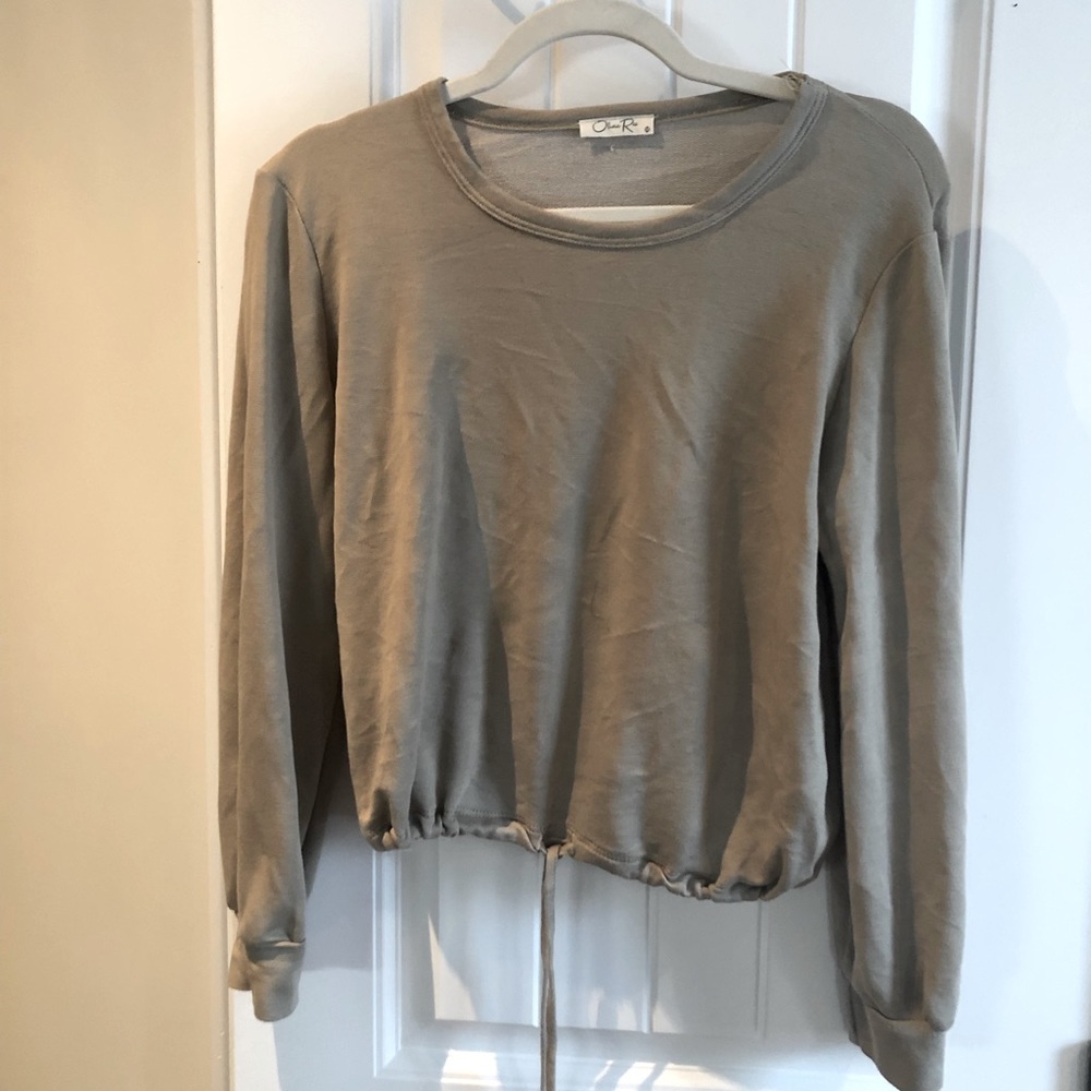 Green sweater, strings
